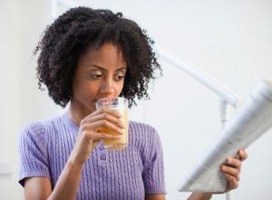 woman-reading-newspaper_400x295_4